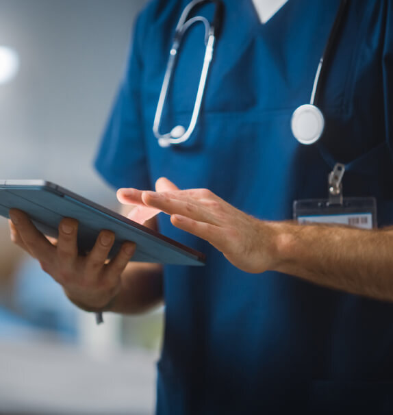 Nurse on tablet.